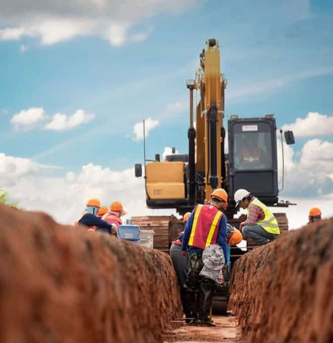 Group Of Worker And Construction Engineer Wear A Safety Uniform — Mannix Plumbing In QLD